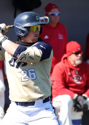 Johnny Wendling batting in gold UIS uniform