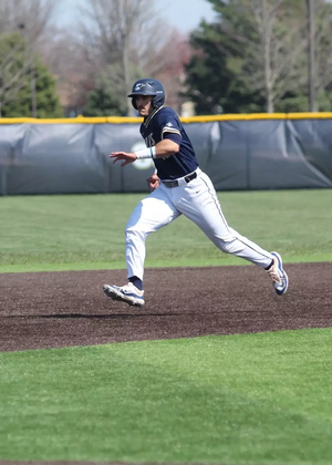 Mark Kattula running to third base