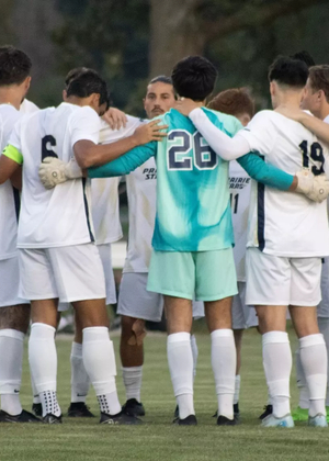 Men's soccer huddle