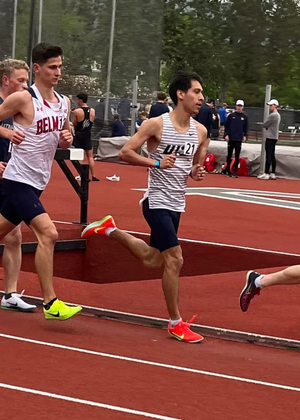 Isaac Cortes running outdoor track