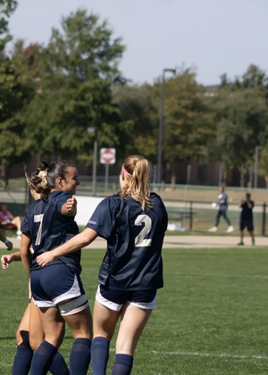 Kalli Drexler and Taytum Scarborough celebrating