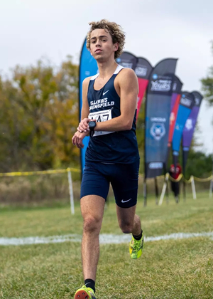 Charlie Borlin finishing XC race