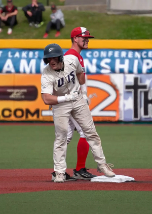 Ethan Bowers celebrates on second base