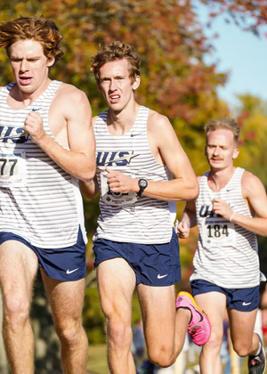Balin Doud, Noah Tegeler, and Brock Loftus running cross country