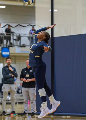Erica Sledge playing volleyball