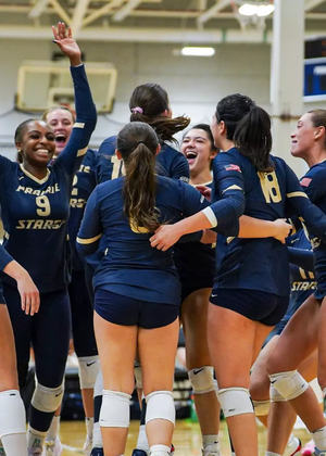 UIS volleyball team celebration
