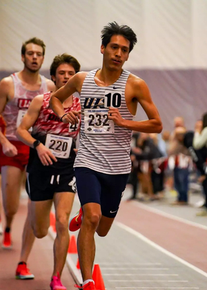 Isaac Cortes racing at GLVC indoor championship