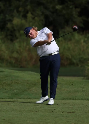 Peyton Woods playing golf