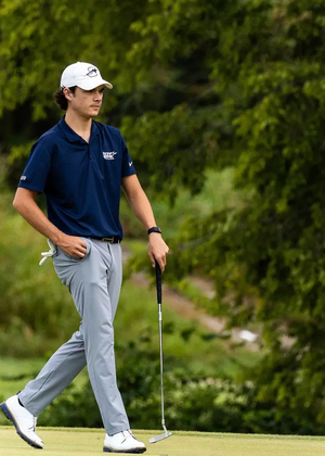 Jake Baldin walking on the green