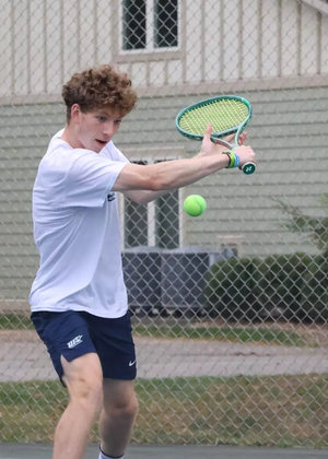 Kai Van-Roon playing tennis