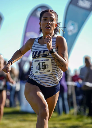 Kaleigh Inniss finishing cross country race