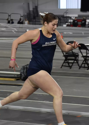 Kalli Drexler running track in blue UIS uniform