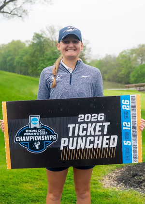 Elaine Grant with NCAA "Ticket Punched" sign