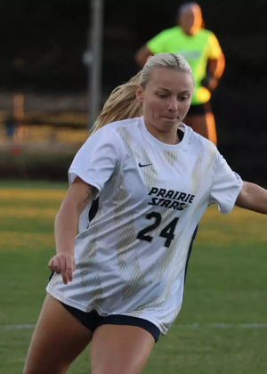 Maggie Joos playing soccer
