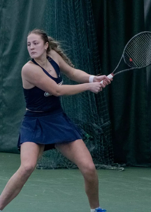 Niamh Grogan playing tennis