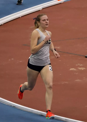 Norah Wright racing indoor track