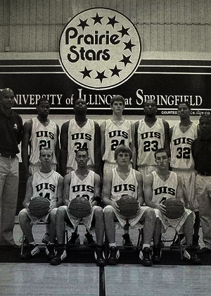 A newspaper clipping of head UIS Basketball Coach Kevin Gamble and his team