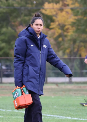 Samantha Fuentes, athletic trainer on field at UIS