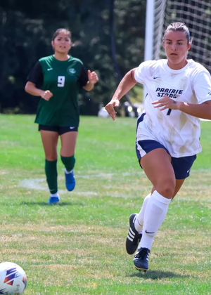 Taytum Scarborough playing soccer