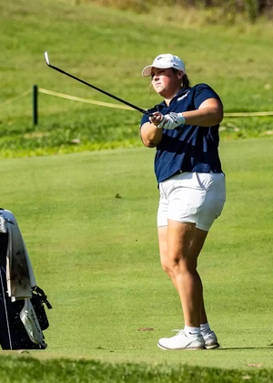 Isabelle Segal golfing