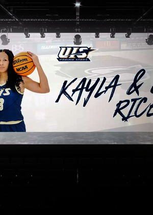 An edit of Kayla & Jordan Rice on the big screen at the front of a theater