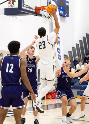 Tye Banks playing basketball at UIS