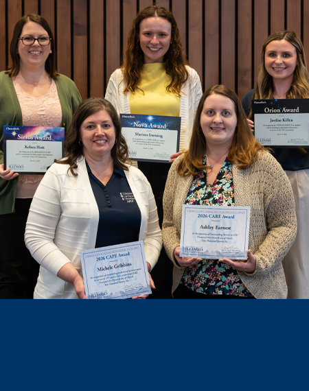 Five women smiling and holding certificates.