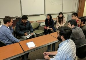 students at a roundtable discussion