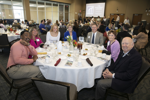 group of attendees posing for picture at scholarship luncheon