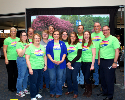 A group of men and women from the UIS Division of Advancement posing for a photo.