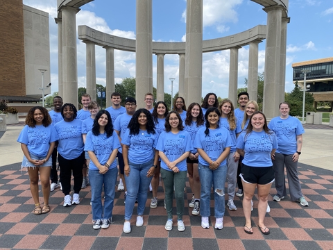 Resident Assistant group photo in front of colonnade from 2023.