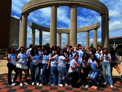 Resident Assistant group photo in front of the colonnade from 2024