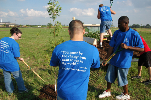UIS volunteers planting trees