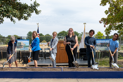 UIS leaders, students and officials break ground for the Library Commons with ceremonial shovels.