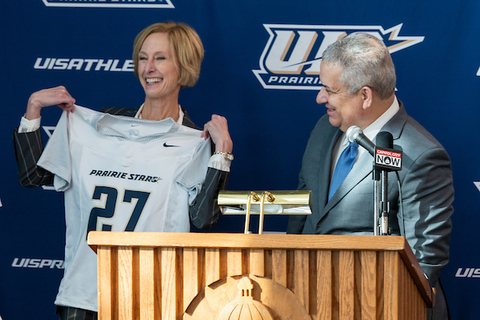 Chancellor Gooch and AD Mike Herman announce flag football at a press conference.