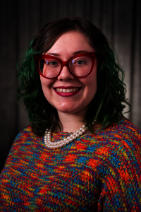 Headshot of Dre Duvendack,