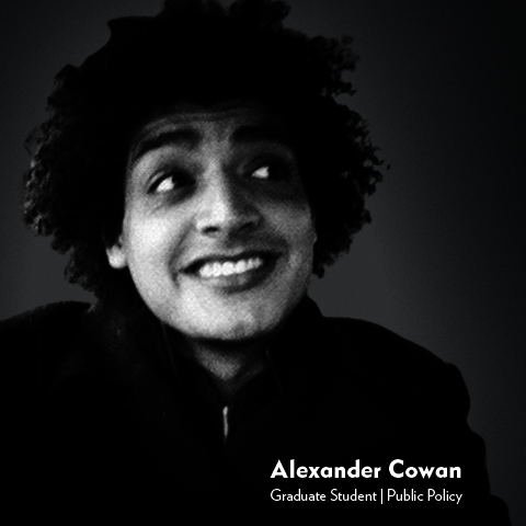 black and white photo of student with a black sweater.