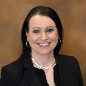 Headshot of Gina Sheurman.