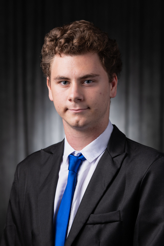 Professional headshot of SGA Parliamentarian