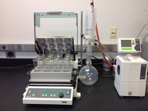 a multievaporator, with 12 vials and a beaker that pipes to some sort of reader