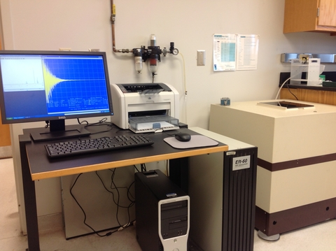 a spectrometer next to a desktop computer