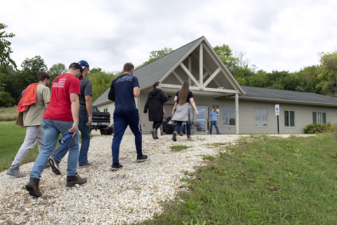 students walking up to the Field Station