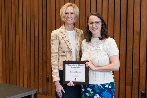 Lauren McPherson with Chancellor Gooch and Lauren's framed certificate for the 2025 Adjunct Faculty of the Year Award.