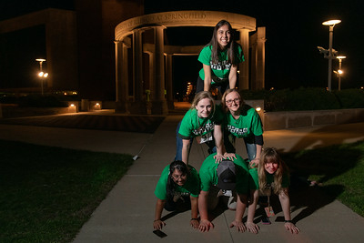 6 UIS students making a human pyramid at the 2019 Scavenger Hunt