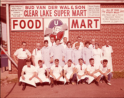 employees posing for group photo