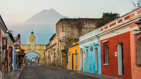 Guatemala City, colorful city with volcano in background
