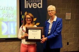 Dr. Adriana Crocker receiving the Pearson Faculty Award