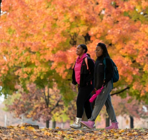 Tuition Waivers - Student Walking Campus