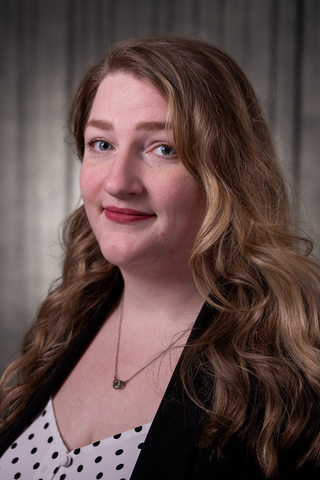 Carissa Isenberg head-and-shoulders photo in business attire