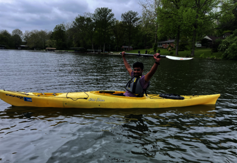 someone kayaking